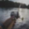 person holding black and silver fishing reel_edited.jpg